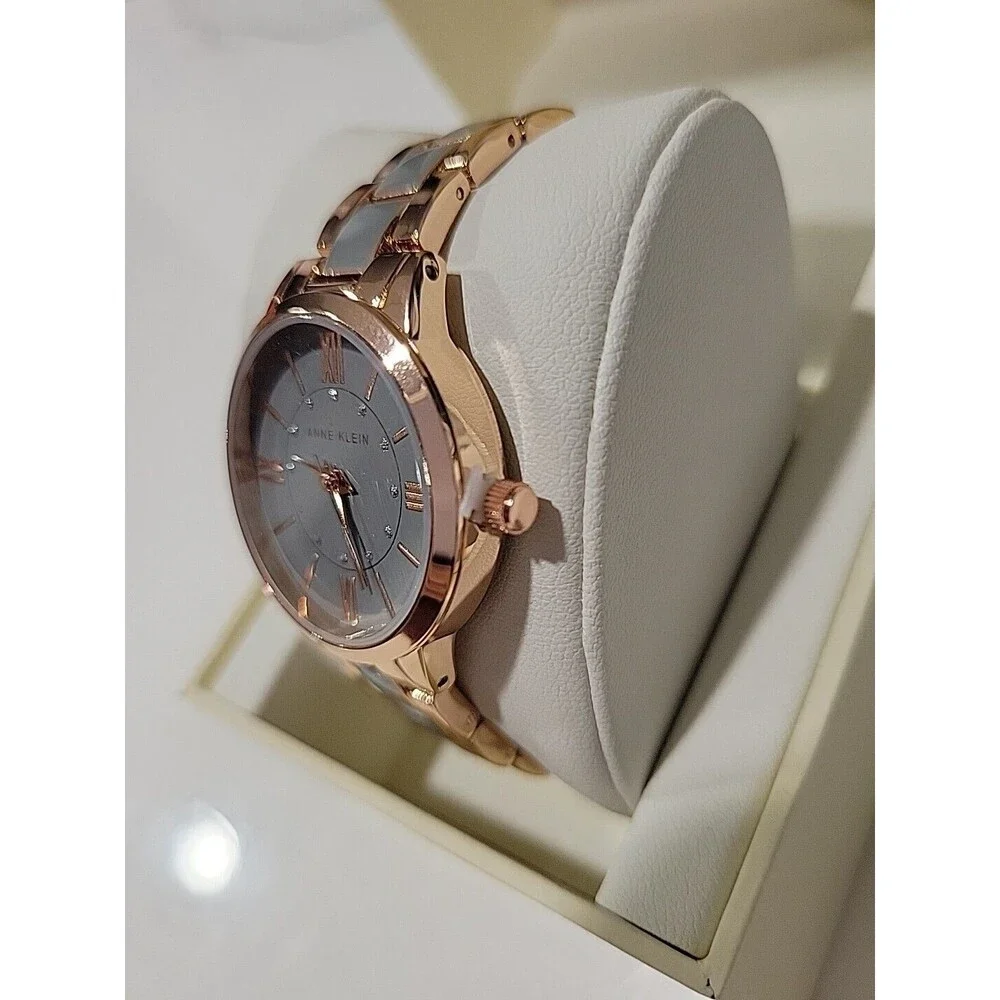 Anne Klein Women's Rose Gold-Tone and Light Pink Resin Bracelet Watch